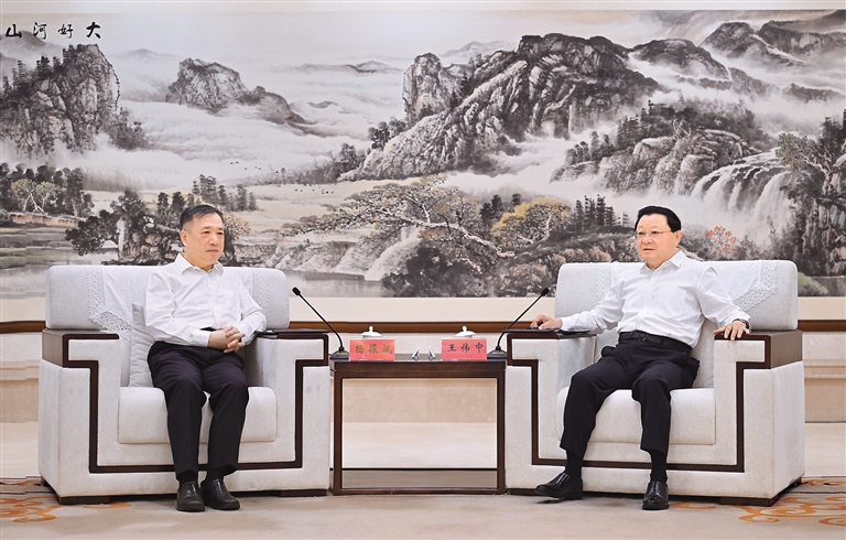 王伟中会见上海交通大学党委书记杨